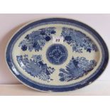 An early 19th century oval Chinese hard-paste porcelain dish; hand-decorated in underglaze blue