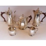 A heavy five-piece hallmarked silver tea and coffee service comprising coffee pot, teapot, hot-water