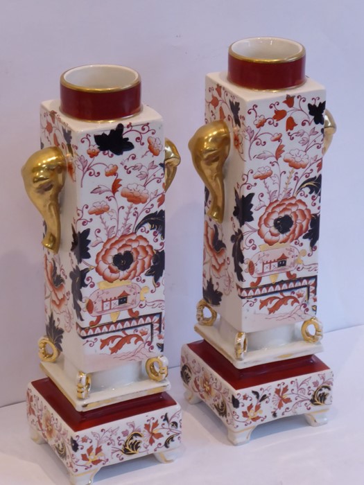 A pair of late 19th century pottery vases hand-gilded and decorated in the Imari palette; each - Image 2 of 5