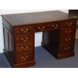 An Edwardian/early 20th century mahogany pedestal desk, the thumbnail-moulded green-leather inset