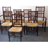 Harlequin set of eight (6+2) 19th century spindle back ash chairs having rush seats