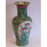 A late 19th century Chinese porcelain vase; flaring lip above a cylindrical neck and a baluster-