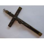 A late 19th/early 20th Century crucifix, the metal Christ figure against an ebony cross with a heavy