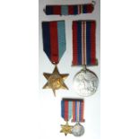 The 1939-1945 Star and War Medal together with corresponding miniatures and ribbon bar