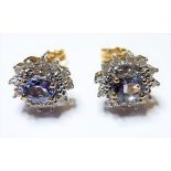 9 carat gold topaz and diamond ear studs