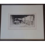 A framed and glazed monochrome etching, a river boat/barge scene with figures shovelling coal into a