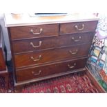 A late 18th century mahogany chest; moulded top above two half-width and three full-width