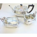A heavy hallmarked silver three-piece tea service in the Georgian style and comprising teapot, two-