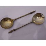 A pair of early-style hallmarked silver apostle spoons; maker's mark R.S., assayed London 1887 (