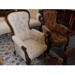 Two similar mid 19th Century carved mahogany and button back upholstered spoon back chairs, each