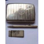 A hallmarked silver kidney-shaped cigarette case with Birmingham assay marks, together with a