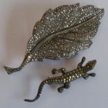 A silver Art Deco style brooch modelled as a leaf and set with marcasites (7.75cm); together with