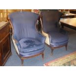 A fine and unusual pair of 19th century upholstered and carved mahogany show-wood armchairs, the