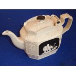 A scarce late 18th century Dunderdale Yorkshire Pottery teapot; decorated in relief in the neo-