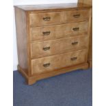 The matching chest of two half-width over three full-width graduated drawers, raised on short
