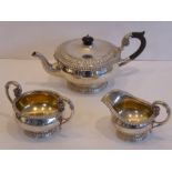 A heavy hallmarked silver three-piece tea service; in the early 19th century style and comprising