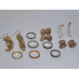 A small selection of mostly costume jewellery to include rings, earrings, two pairs of cufflinks,
