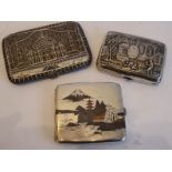 Three silver cigarette cases: an ornate late 19th or early 20th century silver filigree Indian