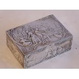 A Dutch 19th century silver box decorated in repoussé-style; maritime scenes with figures, boats and