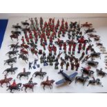 A large collection of military-style painted lead figures; some mounted, most with weapons,