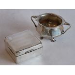 An octagonal two-handled hallmarked silver sugar bowl on four feet, assayed Sheffield 1913; together