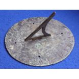 A rare Charles I period patinated circular bronze sundial; with gnomon, Roman numeral markers and