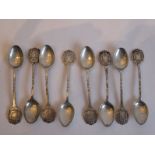 A set of eight hallmarked silver teaspoons; each terminal with armorial and marked for N.P.U.B.E.