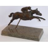 PHILIP BLACKER (British b. 1948); a fine patinated bronze of a National Hunt jockey and horse