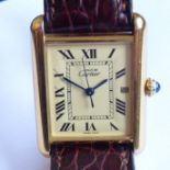 A gentleman's Must De Cartier silver-gilt-cased Tank wristwatch; the signed gold-coloured