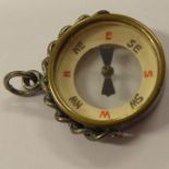 A silver-mounted compass fob; maker's mark W. J. P., assayed Chester 1924
