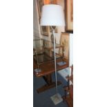 An Italian iGuzzini luminary diapason standard lamp with original shade