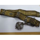 An Edwardian stitched yellow-metal and white-metal belt, set with a filigree chatelaine (54.5 cms)