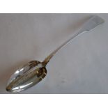 A hallmarked silver fiddle-pattern basting spoon; the ball with central pierced divider, assayed