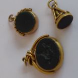 A 19th century 18-carat yellow-gold oval swivel fob, the bloodstone intaglio-decorated with an