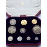 A 1911 gold and silver ten-coin specimen set; 1d to sovereign, in original crimson case of issue