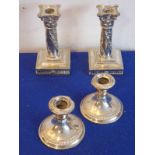 A pair of early 19th century classical-style silver-plated candlesticks with acanthus capitals (