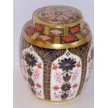 A Royal Crown Derby jar and cover; hand-gilded and decorated in the 1128 pattern (17.5cm)