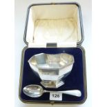 A cased hallmarked silver octagonal bowl and spoon set; maker's mark HE LD, assayed Sheffield 1926