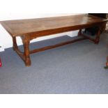 A large 17th century-style (20th century reproduction) three-plank oak refectory table with