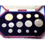 An 1902 thirteen-coin specimen set comprising four gold coins ranging from half-sovereign to £5