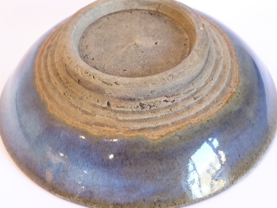 A Chinese Yuan/Ming Junware circular dish; sky-blue glaze raised on unglazed circular foot (12.5cm - Image 3 of 4