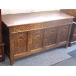 A late 17th century oak chest of boarded construction and good colour; the chip-carved hinged lid