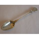 A large and heavy double-struck hallmarked silver basting spoon, maker's mark S.H.D., assayed London