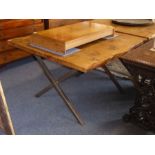 A modern cross-framed steel based centre table having shaped figured thick oak top, approx. (114cm x