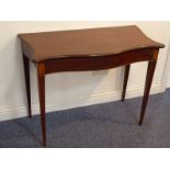 A late 18th century serpentine-fronted mahogany and boxwood-strung side table (probably formally a