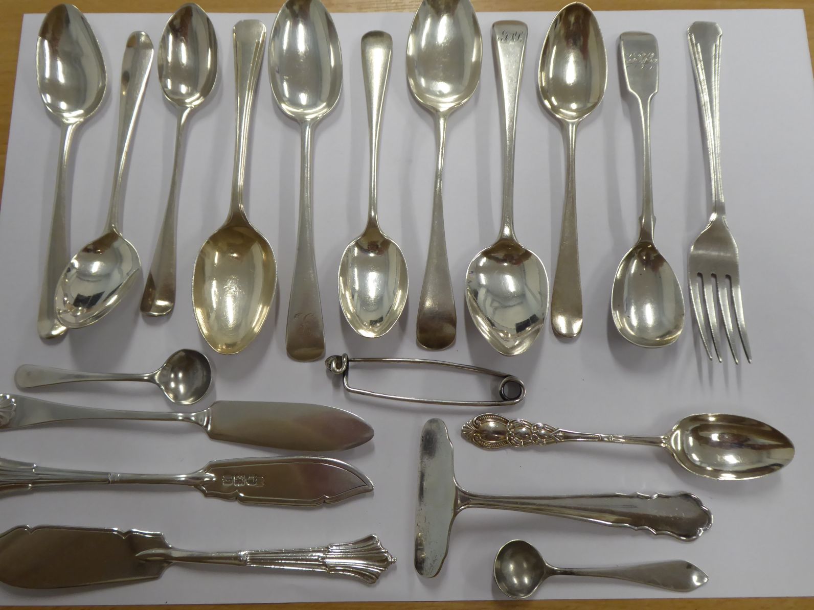 A selection of various Georgian teaspoons and other associated silverware (some later) to include