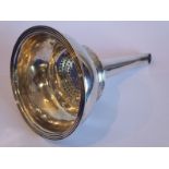 A hallmarked silver two-piece wine funnel, the bowl with reeded edge and hallmarked London 1806, the