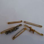 Three 9-carat yellow-gold bar stick-pin brooches; together with two other brooches, one modelled