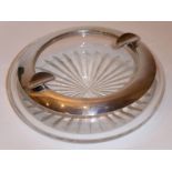 A circular hand-cut glass ashtray with silver-mounted rim marked 800 (14cm in diameter)