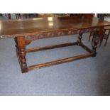 Mid 17th century style oak refectory / side table, a planked top with cleated ends above a single